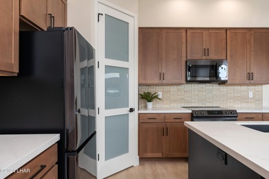 This brand-new townhome in Residential Estates bordering the on London Bridge Golf Course in Arizona - for sale on GolfHomes.com, golf home, golf lot