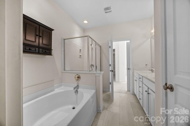 Located in the highly sought-after North Charlotte community of on Highland Creek Golf Club in North Carolina - for sale on GolfHomes.com, golf home, golf lot