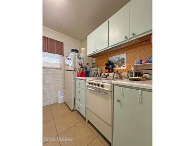 Beautifully updated downstairs unit in Central Tucson featuring on Randolph Park Golf Courses in Arizona - for sale on GolfHomes.com, golf home, golf lot