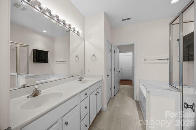 Located in the highly sought-after North Charlotte community of on Highland Creek Golf Club in North Carolina - for sale on GolfHomes.com, golf home, golf lot