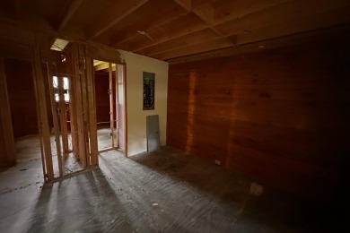 This is an AS-IS property that has been cleaned and gutted on Pocono Farms Country Club in Pennsylvania - for sale on GolfHomes.com, golf home, golf lot