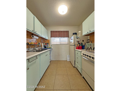 Beautifully updated downstairs unit in Central Tucson featuring on Randolph Park Golf Courses in Arizona - for sale on GolfHomes.com, golf home, golf lot