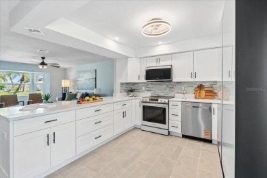 Fully remodeled home with golf and water views in the on Rotonda Golf and Country Club The Hills Course in Florida - for sale on GolfHomes.com, golf home, golf lot