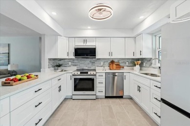 Fully remodeled home with golf and water views in the on Rotonda Golf and Country Club The Hills Course in Florida - for sale on GolfHomes.com, golf home, golf lot