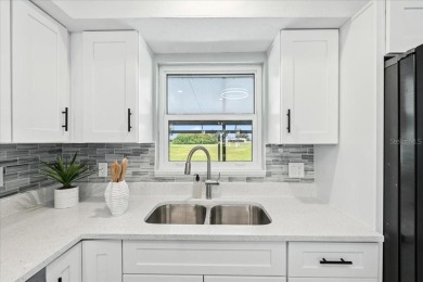 Fully remodeled home with golf and water views in the on Rotonda Golf and Country Club The Hills Course in Florida - for sale on GolfHomes.com, golf home, golf lot