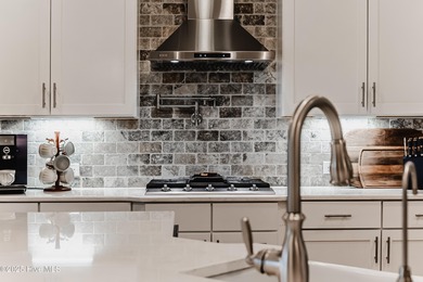 Luxury Townhome | Stunning Golf & Water Views | Elevator | Fully on Sea Trail Golf Resort in North Carolina - for sale on GolfHomes.com, golf home, golf lot