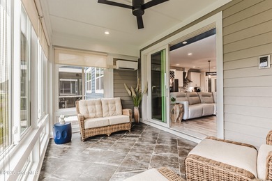 Luxury Townhome | Stunning Golf & Water Views | Elevator | Fully on Sea Trail Golf Resort in North Carolina - for sale on GolfHomes.com, golf home, golf lot