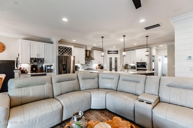 Luxury Townhome | Stunning Golf & Water Views | Elevator | Fully on Sea Trail Golf Resort in North Carolina - for sale on GolfHomes.com, golf home, golf lot