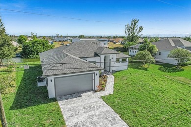 Welcome to 127 NW 14th Ave!!! Come see this beautiful new on Burnt Store Golf Club in Florida - for sale on GolfHomes.com, golf home, golf lot