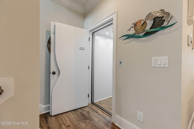 Luxury Townhome | Stunning Golf & Water Views | Elevator | Fully on Sea Trail Golf Resort in North Carolina - for sale on GolfHomes.com, golf home, golf lot