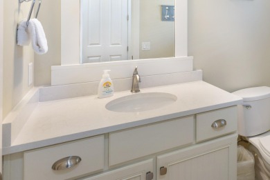 Located in the esteemed Laurel Grove enclave within the gates on Sandestin Golf and Beach Resort - Raven in Florida - for sale on GolfHomes.com, golf home, golf lot