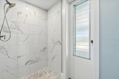 Fully remodeled home with golf and water views in the on Rotonda Golf and Country Club The Hills Course in Florida - for sale on GolfHomes.com, golf home, golf lot