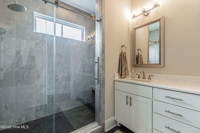 Luxury Townhome | Stunning Golf & Water Views | Elevator | Fully on Sea Trail Golf Resort in North Carolina - for sale on GolfHomes.com, golf home, golf lot