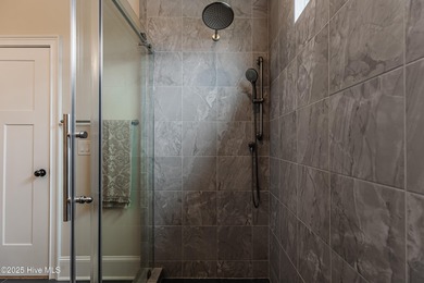 Luxury Townhome | Stunning Golf & Water Views | Elevator | Fully on Sea Trail Golf Resort in North Carolina - for sale on GolfHomes.com, golf home, golf lot