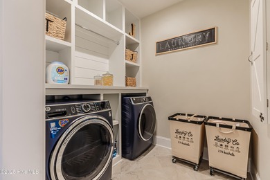 Luxury Townhome | Stunning Golf & Water Views | Elevator | Fully on Sea Trail Golf Resort in North Carolina - for sale on GolfHomes.com, golf home, golf lot