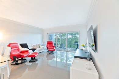 Elegantly furnished 3-bedroom, 2-bathroom corner unit condo on Palm-Aire Country Club and Resort - The Oaks in Florida - for sale on GolfHomes.com, golf home, golf lot