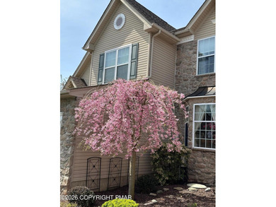 This pristine 3-bedroom, 2.5-bath townhome boasts an impressive on Country Club of the Poconos Golf Course in Pennsylvania - for sale on GolfHomes.com, golf home, golf lot