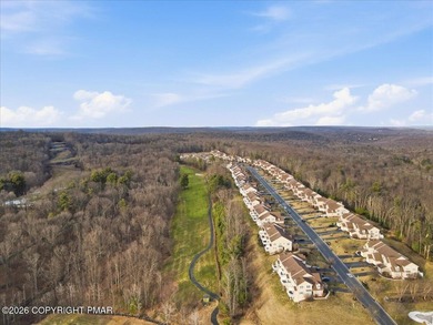 This pristine 3-bedroom, 2.5-bath townhome boasts an impressive on Country Club of the Poconos Golf Course in Pennsylvania - for sale on GolfHomes.com, golf home, golf lot