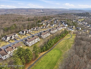 This pristine 3-bedroom, 2.5-bath townhome boasts an impressive on Country Club of the Poconos Golf Course in Pennsylvania - for sale on GolfHomes.com, golf home, golf lot