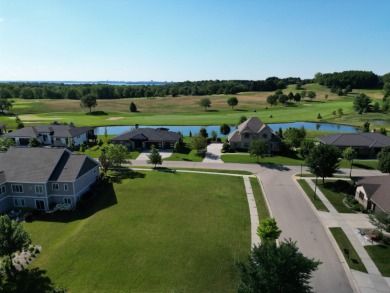 Desirable corner lot offers views of the Bishops Bay Golf Course on Bishops Bay Country Club in Wisconsin - for sale on GolfHomes.com, golf home, golf lot