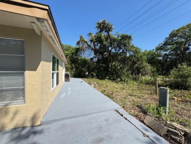 Under contract-accepting backup offers. This stunning move-in on Beacon Woods Golf Club in Florida - for sale on GolfHomes.com, golf home, golf lot