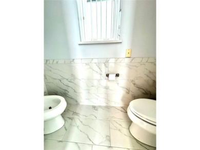 Live where luxury meets lifestyle in this stunning executive on LPGA International Golf Course in Florida - for sale on GolfHomes.com, golf home, golf lot