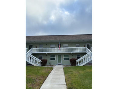 Step inside this condo and appreciate the bright, open floor on Tarpon Springs Golf Course in Florida - for sale on GolfHomes.com, golf home, golf lot