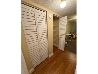 Step inside this condo and appreciate the bright, open floor on Tarpon Springs Golf Course in Florida - for sale on GolfHomes.com, golf home, golf lot