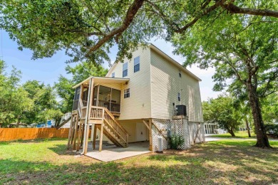 Welcome to 154 Cedar Point Avenue, a classic raised beach home on Wachesaw Plantation Club in South Carolina - for sale on GolfHomes.com, golf home, golf lot