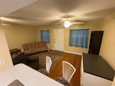 Step inside this condo and appreciate the bright, open floor on Tarpon Springs Golf Course in Florida - for sale on GolfHomes.com, golf home, golf lot