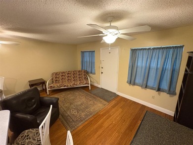 Step inside this condo and appreciate the bright, open floor on Tarpon Springs Golf Course in Florida - for sale on GolfHomes.com, golf home, golf lot