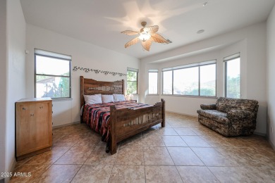 Welcome to this beautifully designed 4-bedroom, 2-bathroom on Estrella Mountain Ranch Golf Course in Arizona - for sale on GolfHomes.com, golf home, golf lot