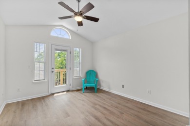 Welcome to 154 Cedar Point Avenue, a classic raised beach home on Wachesaw Plantation Club in South Carolina - for sale on GolfHomes.com, golf home, golf lot
