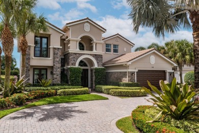 Welcome to your dream home in the prestigious Jupiter Country on Jupiter Country Club in Florida - for sale on GolfHomes.com, golf home, golf lot