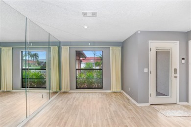 Price Adjustment. This attractive home features a soaring on Sandpiper Golf Club in Florida - for sale on GolfHomes.com, golf home, golf lot