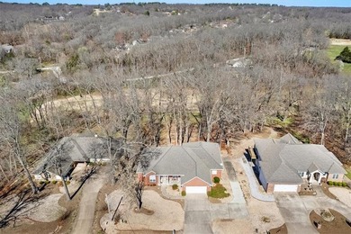 Tucked away on a quiet Bella Vista street, this well-maintained on Bella Vista - Metfield Golf Complex and Country Club in Arkansas - for sale on GolfHomes.com, golf home, golf lot