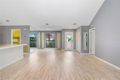 Price Adjustment. This attractive home features a soaring on Sandpiper Golf Club in Florida - for sale on GolfHomes.com, golf home, golf lot