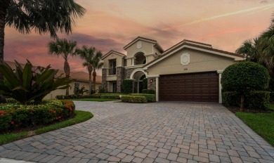 Welcome to your dream home in the prestigious Jupiter Country on Jupiter Country Club in Florida - for sale on GolfHomes.com, golf home, golf lot