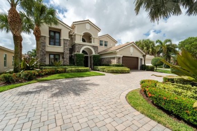 Welcome to your dream home in the prestigious Jupiter Country on Jupiter Country Club in Florida - for sale on GolfHomes.com, golf home, golf lot