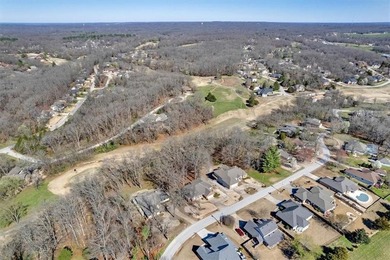 Tucked away on a quiet Bella Vista street, this well-maintained on Bella Vista - Metfield Golf Complex and Country Club in Arkansas - for sale on GolfHomes.com, golf home, golf lot