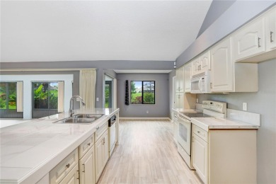 Price Adjustment. This attractive home features a soaring on Sandpiper Golf Club in Florida - for sale on GolfHomes.com, golf home, golf lot