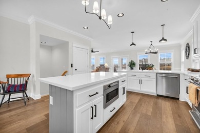 Imagine waking up every day in a lakefront home, sipping your on The Patriot Golf Club At Grand Harbor in South Carolina - for sale on GolfHomes.com, golf home, golf lot