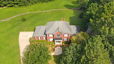 Nestled on a serene, private cul-de-sac at 110 Explorer Lane in on Hunters Creek Golf and Country Club  in South Carolina - for sale on GolfHomes.com, golf home, golf lot