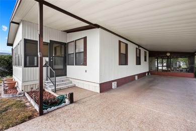 Are you looking for a cozy Florida retreat to escape the cold on Betmar Acres Golf Club in Florida - for sale on GolfHomes.com, golf home, golf lot