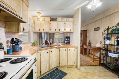 Are you looking for a cozy Florida retreat to escape the cold on Betmar Acres Golf Club in Florida - for sale on GolfHomes.com, golf home, golf lot