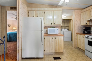 Are you looking for a cozy Florida retreat to escape the cold on Betmar Acres Golf Club in Florida - for sale on GolfHomes.com, golf home, golf lot