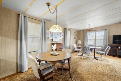 Are you looking for a cozy Florida retreat to escape the cold on Betmar Acres Golf Club in Florida - for sale on GolfHomes.com, golf home, golf lot