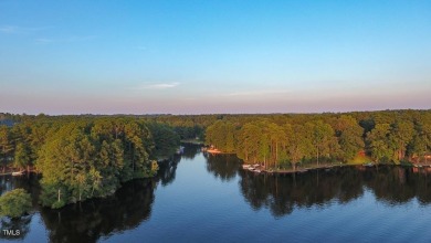 Welcome to Lake Royale! This is truly a unique opportunity with on River Golf and County Club at Lake Royale in North Carolina - for sale on GolfHomes.com, golf home, golf lot