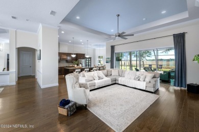 LUXURY LIFESTYLE! Indulge in a captivating pool home centrally on Golf Club At North Hampton in Florida - for sale on GolfHomes.com, golf home, golf lot