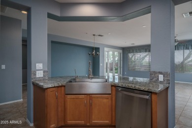 Located in guard-gated Anthem Country Club, this move-in ready on Anthem Golf and Country Club  in Arizona - for sale on GolfHomes.com, golf home, golf lot
